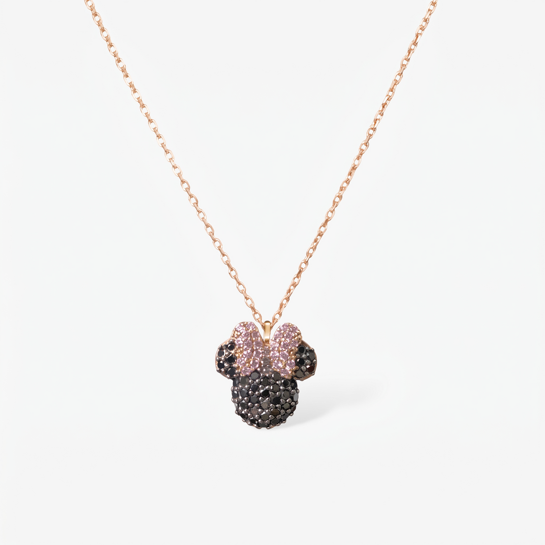 Vienna Minnie Mouse kolye ucu yakın çekim: siyah zirkon taşlı figür ve pembe fiyonk, 14 ayar rose gold kaplama 925 ayar gümüş zincir